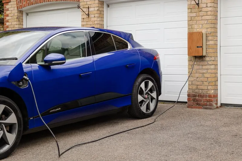 Electric vehicle charging at home garage